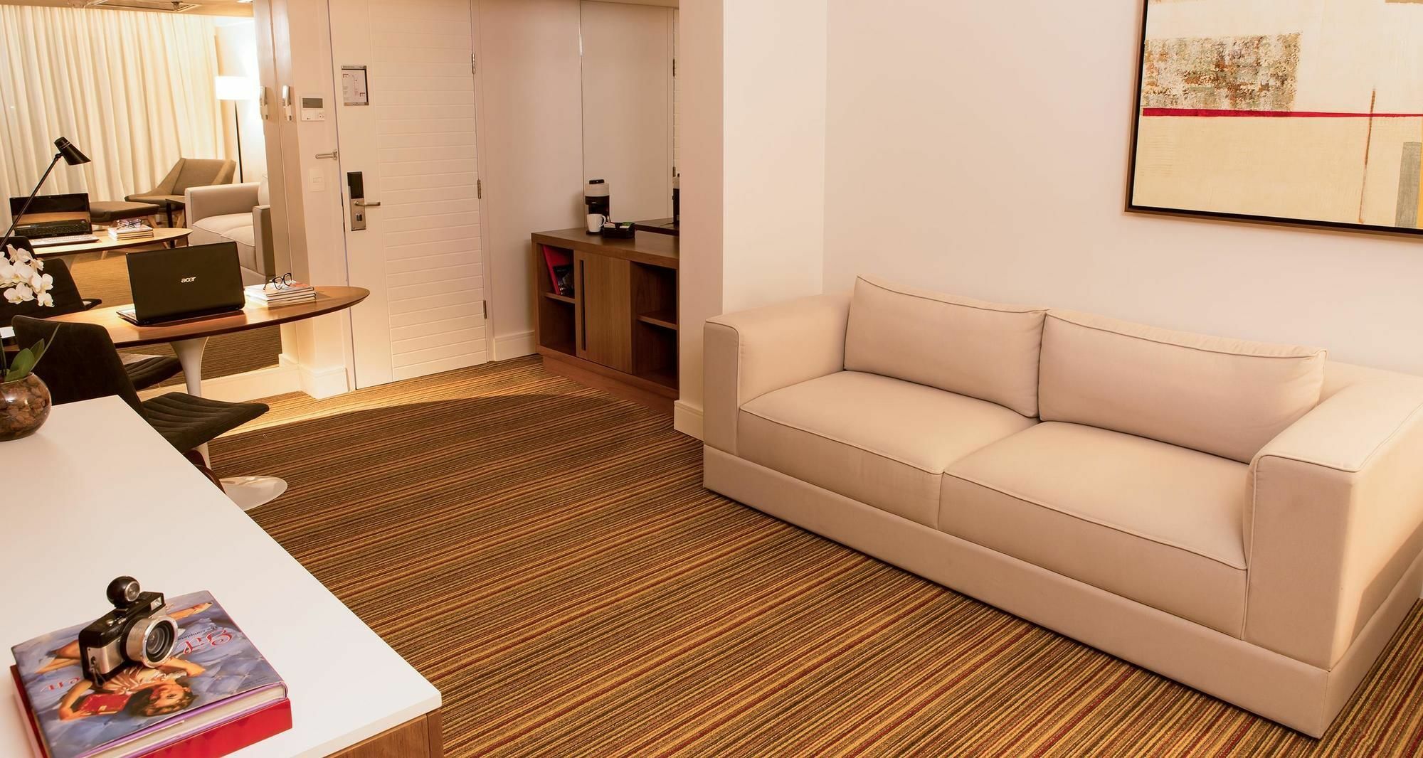 Hotel Pullman Rio De Janeiro Sao Conrado Exterior foto A carpet in a living room
